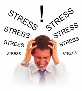 Stress - mand tager sig til hovedet og er super stresset